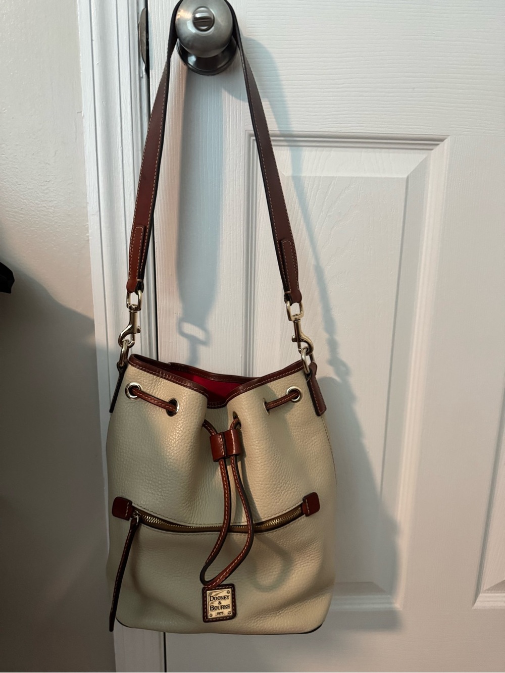 Dooney & Bourke Cream Leather Drawstring Bucket Bag with Brown Trim